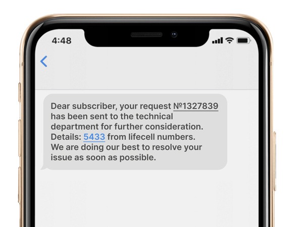 Phone displaying a service notification SMS.