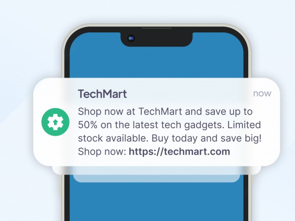 Phone showing a TechMart promo SMS