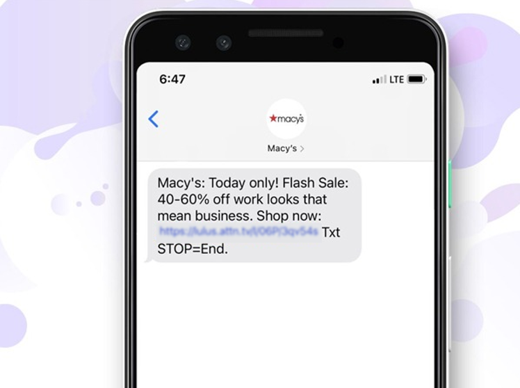 Smartphone displaying a promotional SMS message about a flash sale
