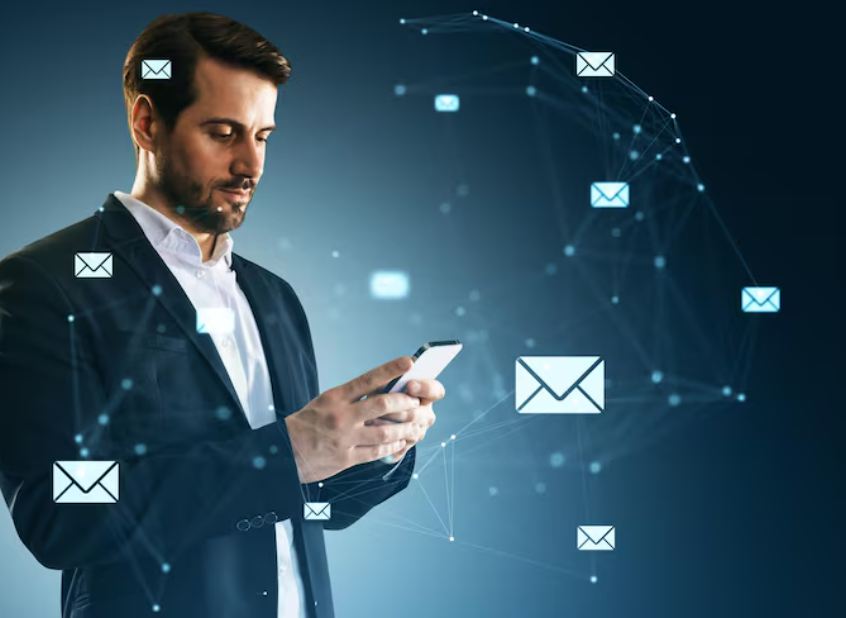 Man using smartphone with digital email and messaging network