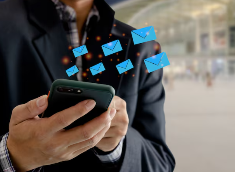 Person using a smartphone to SMS marketing