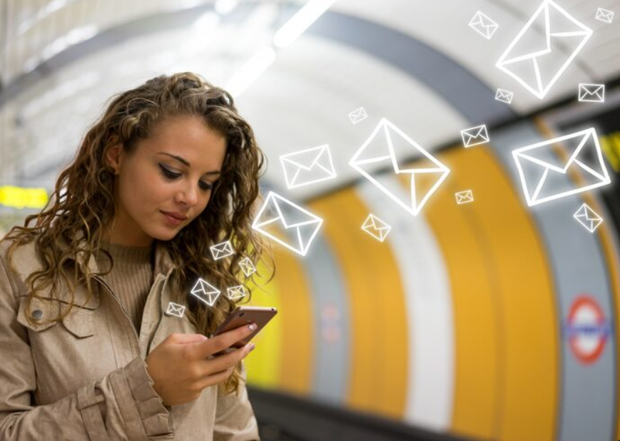 Woman checking messages on her smartphone