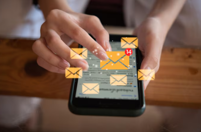 Hands using a smartphone with multiple SMS notification.